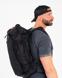 American Fitness Solo Alpha largest tactical carry bag — veteran-designed 1000D Cordura KEVLAR rucksack — worn view