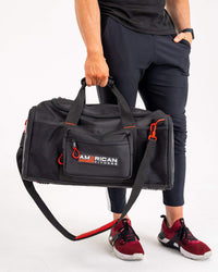 American Fitness Ultimate Journey Duffel gym travel bag — 3 compartments pro athlete designed — worn view