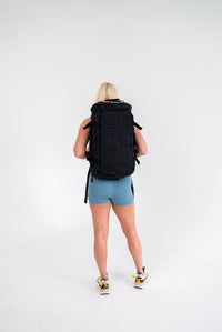 American Fitness Solo Alpha largest tactical carry bag — veteran-designed 1000D Cordura KEVLAR rucksack — flat lay