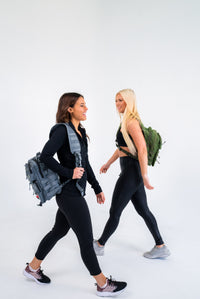 American Fitness AF Bravo Sling Bag — 1000D Cordura KEVLAR stitching tactical EDC sling pack — action shot